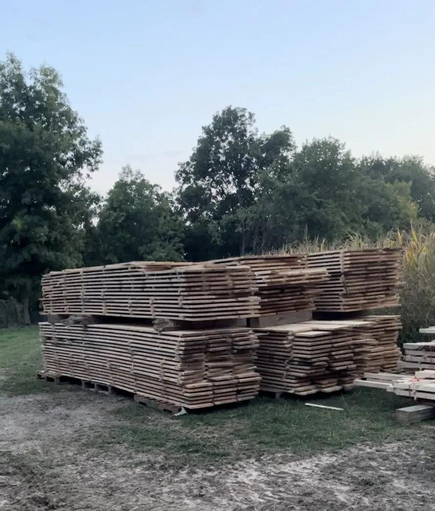 Lumber stacked and stickered in the yard